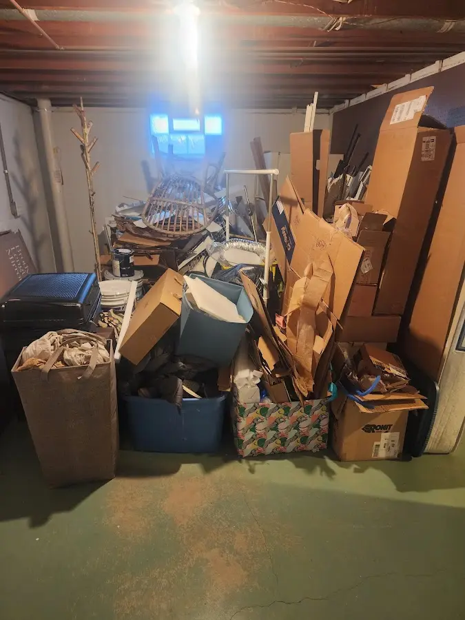 Roll-off dumpster container at job site for 4 Yard Dumpster Rental in Little Falls